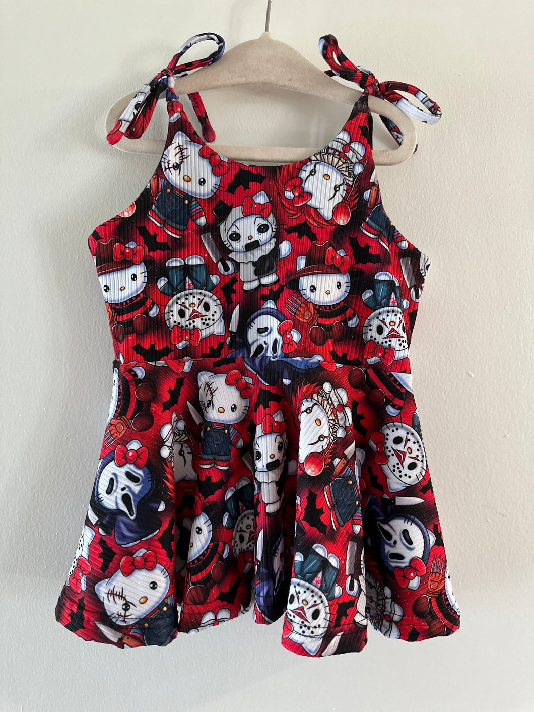 Hello Kitty Slasher Tie Peplum Top